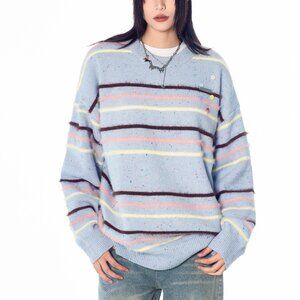 Striped contrasting crew-neck knitwear sweater buttons over a loose top